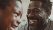 © Mechastock - Black man enjoying a moment with his children / African American family
