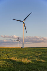 wind turbine on grassy field