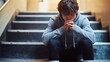 © zongyi - Young Boy Depressed Alone on Stairs Victim of Bullying Anxiety Stress Loneliness Mental Health Issues