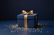 © haiqiang - there is a blue gift box with a gold ribbon and a bow