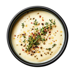 Wall Mural - Creamy Vegetable Soup in Black Bowl with Fresh Thyme and Chili Flakes 