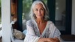 © Oleksandr - Stylish Mature Interior Designer with Gray Hair - Attractive Woman with Chic Attitude Enjoying Leisure on Front Porch of Her Home