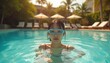 © Thu - Girl swimming in a luxury pool on a sunny day.