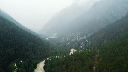 Wall Mural - Aerial view of himalayan mountains at kasol himachal pradesh. Small villages and colorful local houses nested in the hills of parvati valley at kasol, himachal pradesh, India.