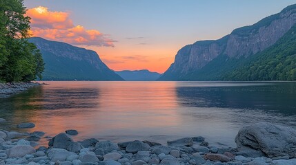 Poster - Serene sunset over calm lake, mountains reflecting in water.