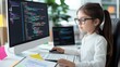 © taelefoto - Young Girl in Glasses Focusing on Computer Screen While Coding and Learning Programming Skills