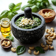 © Anastasiia - Pesto mortar.  Ingredients for pesto sauce. White background