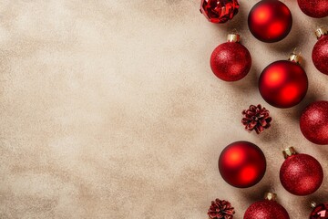 On a light brown table, two gleaming red Christmas ornaments are displayed, shimmering brightly.