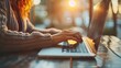 © masanyanka - An Image of a Professional Typing on a Laptop at a Desk in a Modern Digital Workspace
