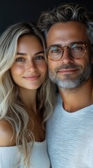 Happy couple smiling and posing together for portrait