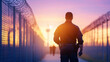 © Kateryna - Corrections Officer Walking Along Prison Yard Fence