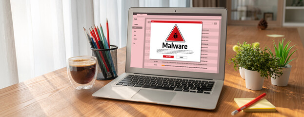 Poster - Cyber attacking concept. Malware alert showing on computer screen display scam and threat detection on computer system or online server to be removed snugly.