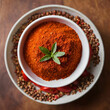 © Hanan - Closeup of a bowl of red pepper spice Selected focus