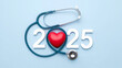 © MOUNSSIF - 2025 Happy New Year for health care.heart health, health insurance concept, new year resolutions goal. yearly health checks and healthy trend. Red heart and stethoscope on blue background