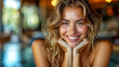 © OLHA - A woman with long blonde hair smiling at the camera