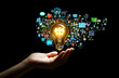 © Саша Федюк - A hand holds a glowing light bulb, symbolizing creativity and innovation, surrounded by various symbols representing ideas, technology, and growth in a dark setting.