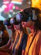 © Business Pics - Group of diverse young teenage friends using vr headsets to explore an interactive world at a vr club