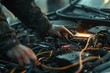 © Deris Firmansyah - Technician Hands of car mechanic working repair in auto repair Service electric battery and Maintenance of car battery. Check the electrical system inside the car.