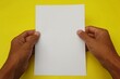 © Isman - hand holding blank paper