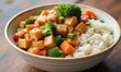 © Alex - Colorful vegetable stir-fry on rice