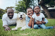 © Allistair F/peopleimages.com - Portrait, relax or black family in backyard with dog, mother or dad in home with child, love and support. Smile, parents or happy mom with father or girl kid with pet or golden retriever in Ghana