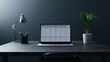 © FoxGrafy - Modern workspace with laptop, plant, and desk lamp