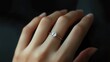 © Kainash - Close-up of Diamond Engagement Ring on Woman's Finger