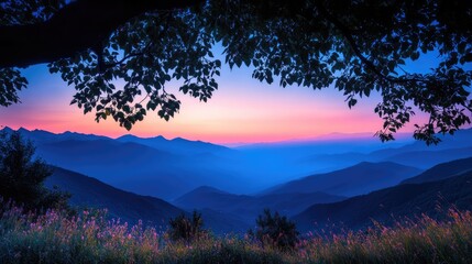 Wall Mural - twilight mountain landscape framed by tree foliage showcasing vibrant blue pink orange and yellow co