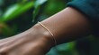 © SY - Dainty gold bracelet on a wrist, close-up. Perfect for jewelry, fashion, and beauty websites or blogs.