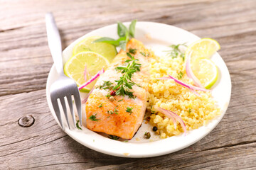 Wall Mural - fried salmon steak with bulgur