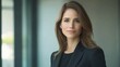 © EUT - Portrait of a confident businesswoman in a black blazer. Ideal for corporate, professional, or leadership themes.