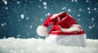 © Zafercan - Santa hat, snow-covered, winter scene, dark blue background, snowfall, cozy atmosphere, holiday theme, serene mood, festive imagery, detailed texture