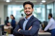 © Shivani - young indian business man standing at office
