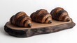 © sctung - Delectable Freshly Baked Croissants on Wooden Board