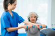 © laddawan - Doctor consulting with patient Back problems Physical on the bed
