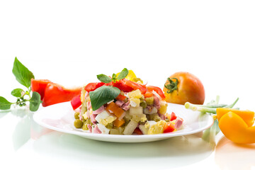 Wall Mural - vegetable salad of boiled vegetables, with peas, sausage, sweet pepper.