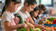 © Elena - A group of young girls are preparing food in a kitchen