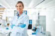 © peopleimages.com - Woman portrait, scientist and arms crossed for innovation in lab, chemical engineer and forensics. Mature person, confident doctor and expert in biology, pathology research and medical study in coat
