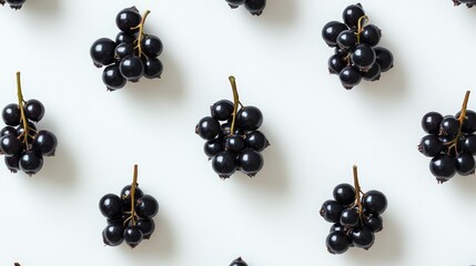 Leinwandbilder - Saskatoon berries arranged artistically on a white background showcasing their rich color and natural beauty for culinary or decorative use