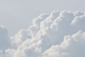 Wall Mural - white cloud background and texture. the sky is filled with fluffy white clouds, creating a serene.