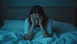 © 2April - Woman in Bed at Night Experiencing Insomnia, Anxiety, or Stress.  Dark Blue and Teal Mood, Mental Health Concept Photography.