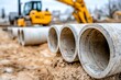 © Dina - Concrete stormwater pipes at construction sites, used for water management and infrastructure projects.