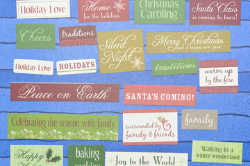 Canvas Print - seasonal holiday messages printed on small labels and arranged on blue paper with stripes