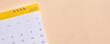 © chinnarach - close up top view on white calendar 2025 month schedule to make appointment meeting or manage timetable each day lay on beige background for planning work and life concept