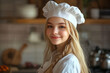 © luismolinero - Young pretty blonde girl at indoor in chef uniform