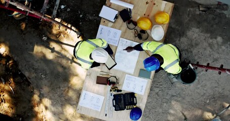 Poster - Above, team and paper on construction site for planning, urban development and project management with tech. Engineer people, blueprint or talking at equipment for building renovation in architecture