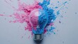 © Boraryn - Creative light bulb explodes with pink and blue color splash paint on a white background. Creation of a creative idea, concept