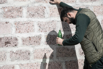 Wall Mural - handsome man with bottle of beer