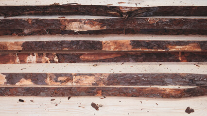Poster - A row of wood with a brown stain on it. The wood is old and has a rough texture