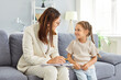 © Studio Romantic - Doctor psychologist conducts a therapy session with a young girl, engaging in a conversation and support. Psychotherapy session focuses on communication and care to mental health for child support.